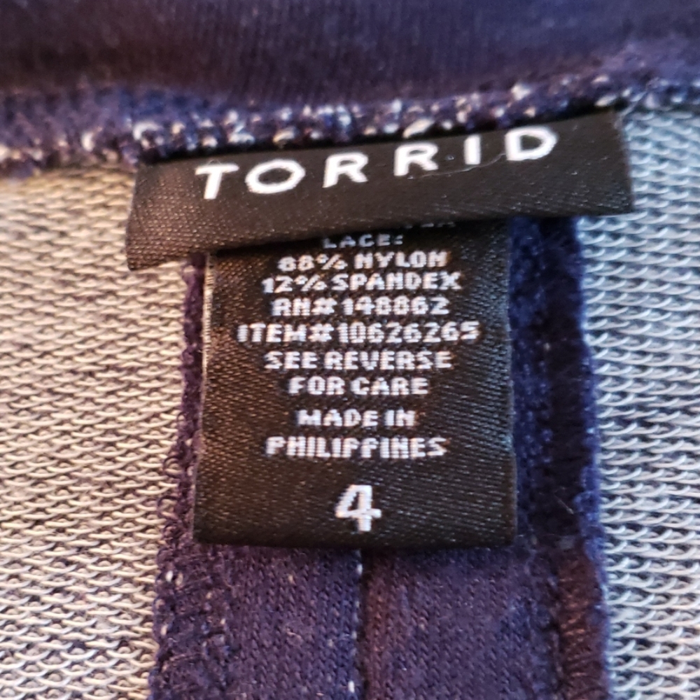 Torrid TOP..SHORT SLEEVE with pleat in back.plus s